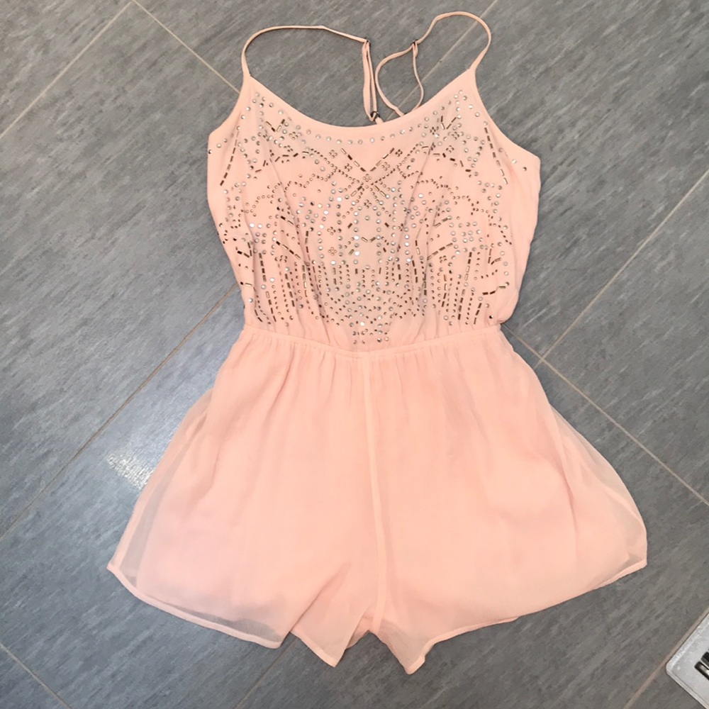 Light pink romper with key hole back